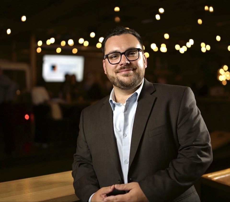 Andrew Rocha at an evening event